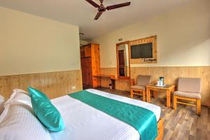 Rúm í herbergi á Hotel Mountain face by Snow City Hotels
