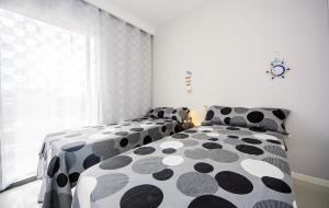 Łóżko lub łóżka w pokoju w obiekcie Penthouse 2 bedrooms in Mil Palmeras