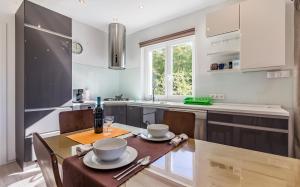 Kuchyň nebo kuchyňský kout v ubytování Apartman Bellavista