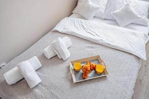 Łóżko lub łóżka w pokoju w obiekcie Apartamenty Novomiejska 17
