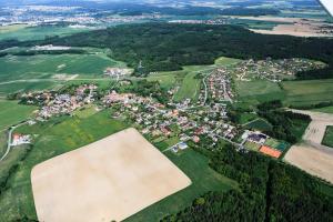an aerial view of a village with houses and trees at Sportpenzion Pohoda in Pilsen