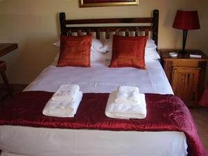 Uma cama ou camas num quarto em Platinum Lodge Polokwane