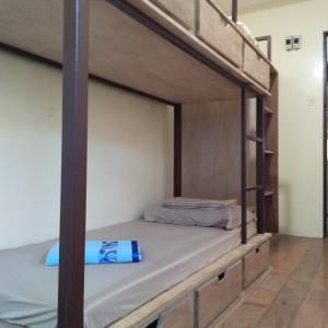 Postel nebo postele na pokoji v ubytování Cebu Pungko-pungko Hostel