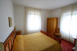 Postel nebo postele na pokoji v ubytování Villa Nencini