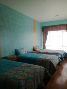 Кровать или кровати в номере The Oruro Inn