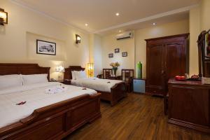 Voodi või voodid majutusasutuse Ibiz City Hotel toas