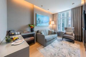 Uma área de estar em CVK Taksim Hotel Istanbul