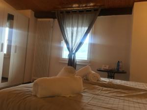 Voodi või voodid majutusasutuse Albergo Ristorante Belcantone toas