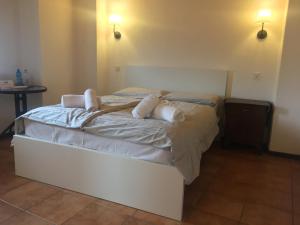 Voodi või voodid majutusasutuse Albergo Ristorante Belcantone toas