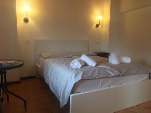 Voodi või voodid majutusasutuse Albergo Ristorante Belcantone toas