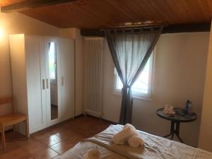 Voodi või voodid majutusasutuse Albergo Ristorante Belcantone toas