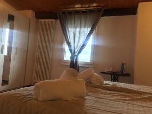 Voodi või voodid majutusasutuse Albergo Ristorante Belcantone toas
