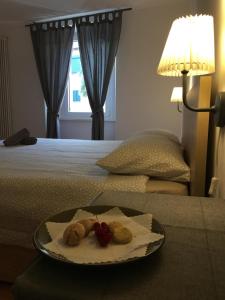 Voodi või voodid majutusasutuse Albergo Ristorante Belcantone toas