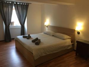 Voodi või voodid majutusasutuse Albergo Ristorante Belcantone toas