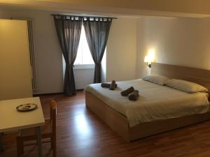 Voodi või voodid majutusasutuse Albergo Ristorante Belcantone toas
