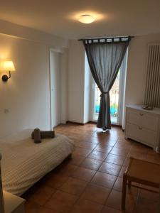 Voodi või voodid majutusasutuse Albergo Ristorante Belcantone toas