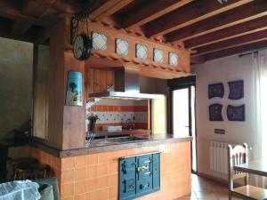 O bucătărie sau chicinetă la Casa rural Lucia +21 fotografii