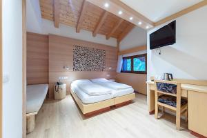 Voodi või voodid majutusasutuse Hotel Cristiania toas