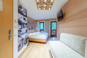 Voodi või voodid majutusasutuse Hotel Cristiania toas