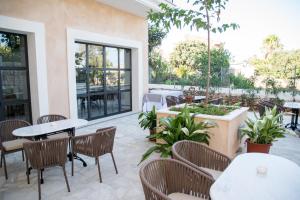 Reštaurácia alebo iné gastronomické zariadenie v ubytovaní Boutique Hotel Petit Sant Miquel