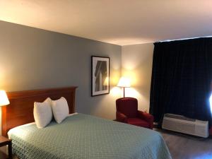 Postel nebo postele na pokoji v ubytování Springfield Inn TN