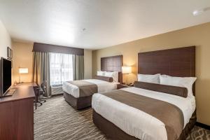 Voodi või voodid majutusasutuse Cobblestone Hotel & Suites - Stevens Point toas
