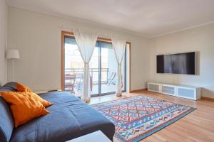 Et tv og/eller underholdning på Algarve Oceanfront Luxury Apartment w Pool