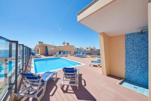 Swimmingpoolen hos eller tæt på Algarve Oceanfront Luxury Apartment w Pool