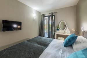 Posteľ alebo postele v izbe v ubytovaní Villa Fjolla