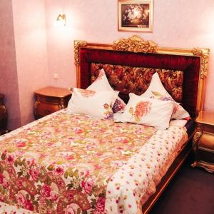 Кровать или кровати в номере Извольте Отель