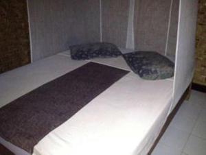 Katil atau katil-katil dalam bilik di Little Woodstock Homestay