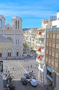 a view of a city street with a church at Splendid apart in the heart of Nice in Nice