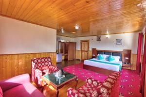 Rúm í herbergi á Hotel Mountain face by Snow City Hotels