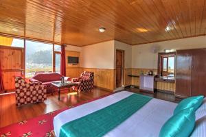 Rúm í herbergi á Hotel Mountain face by Snow City Hotels