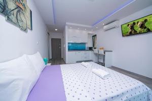 Posteľ alebo postele v izbe v ubytovaní Apartment Roso