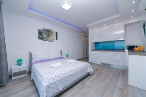 Posteľ alebo postele v izbe v ubytovaní Apartment Roso