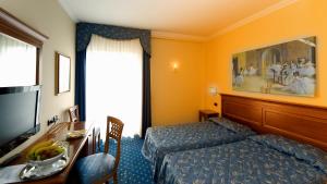 Postel nebo postele na pokoji v ubytování Albergo Costantini