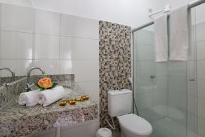 Et badeværelse på Pousada Sol & Mar + 70 billeder