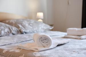 Postel nebo postele na pokoji v ubytování Diva Apartment
