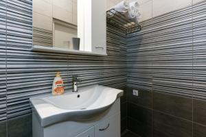 Koupelna v ubytování Diva Apartment
