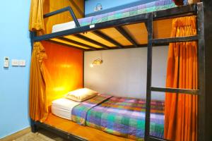 Postel nebo postele na pokoji v ubytování New Ubud Hostel