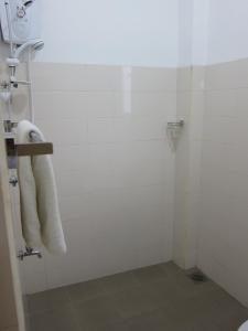 Koupelna v ubytování Hotel Oviya