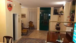 TV a/nebo společenská místnost v ubytování I 13 Cavalieri Guest House