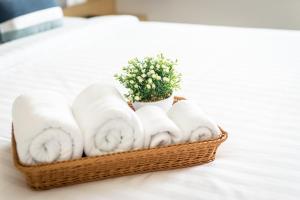 Ein Bett oder Betten in einem Zimmer der Unterkunft APA-TREE Boutique Hotel