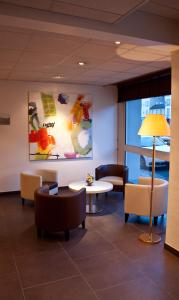 Posezení v ubytování BRIT HOTEL Confort Le Limouzi TULLE