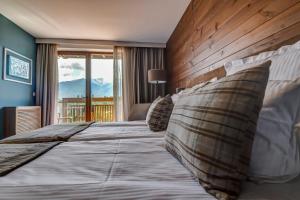 Postel nebo postele na pokoji v ubytování Katarino SPA Hotel