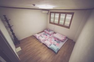 Letto o letti in una camera di Wansangolgh Guest House