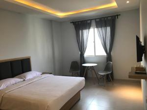 Postel nebo postele na pokoji v ubytování Hotel Arisu + 27 fotografií