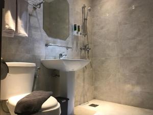Baðherbergi á Hotel Arisu