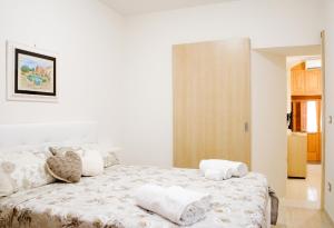 Łóżko lub łóżka w pokoju w obiekcie Rosa Holiday Home
